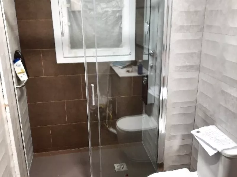 Imagen de baño reformado en un proyecto residencial